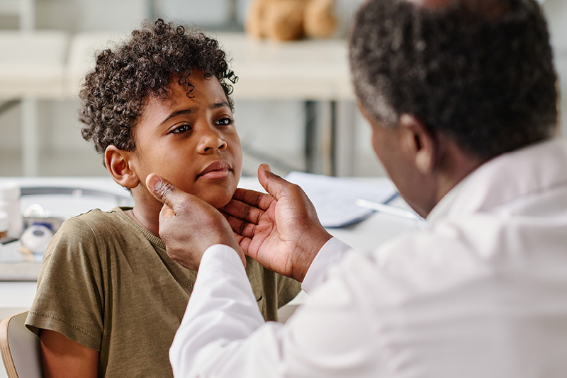 Doctor examining a child