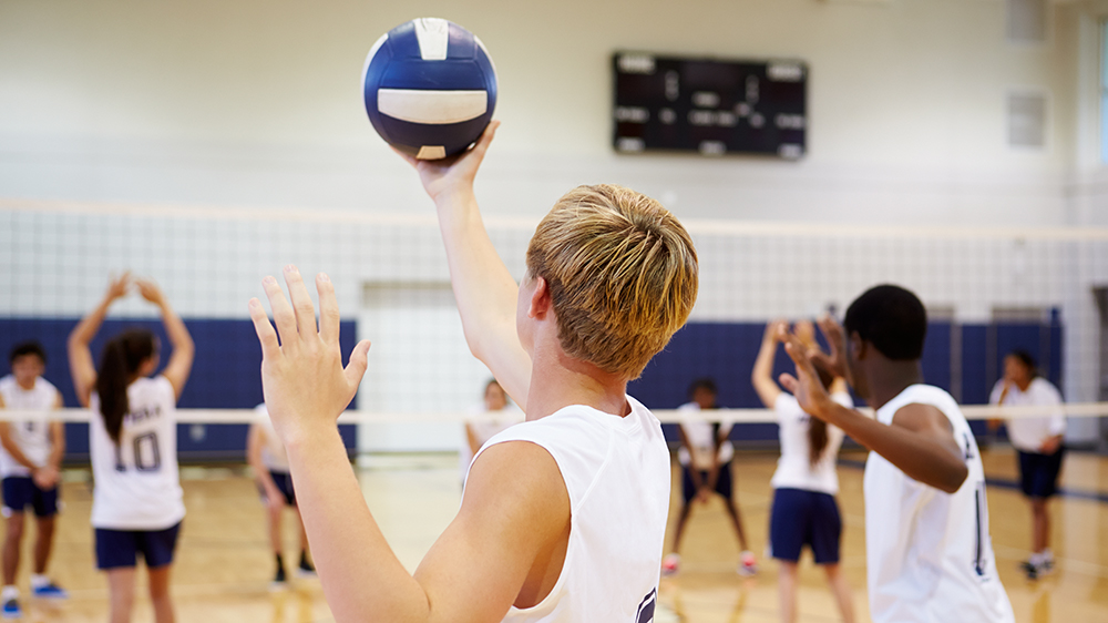 Boy playing volleyball